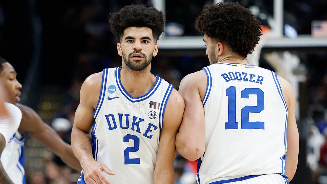 Mar 29, 2026; Washington, DC, USA; Duke Blue Devils guard Cayden Boozer (2) celebrates with Blue Devils forward Cameron Boozer (12) after scoring against the UConn Huskies in the first half during an Elite Eight game of the East Regional of the men's 2026 NCAA Tournament at Capital One Arena. Mandatory Credit: Amber Searls-Imagn Images