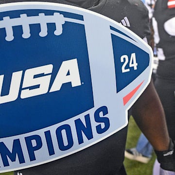 Jacksonville State football players celebrate winning the C-USA Championship at AmFirst Stadium in Jacksonville, Alabama , Alabama December 6, 2024. Jacksonville State defeated Western Kentucky 52 - 12. (Dave Hyatt / Hyatt Media LLC)