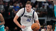 Oct 11, 2025; Dallas, Texas, USA; Dallas Mavericks forward Cooper Flagg (32) dribbles up court against the Charlotte Hornets in the second half of a game at American Airlines Center. Mandatory Credit: Raymond Carlin III-Imagn Images