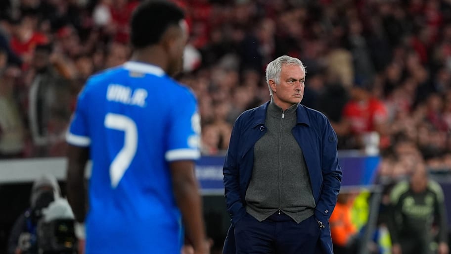 José Mourinho (right) and Vinicius Junior.