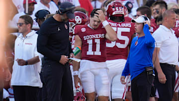 Oklahoma Sooners quarterback Jackson Arnold (11) stands on the sideline during a college football game between the University of Oklahoma Sooners (OU) and the Tulane Green Wave.