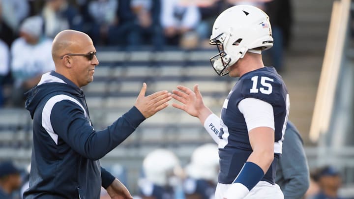 Penn State head coach James Franklin greets quarterback Drew Allar 