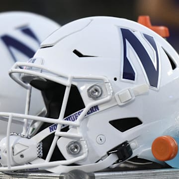 Sep 18, 2021; Durham, North Carolina, USA; A Northwestern Wildcats helmet sits on an equipment chest during the fourth quarter at Wallace Wade Stadium. Mandatory Credit: William Howard-Imagn Images