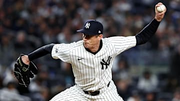 Oct 15, 2024; Bronx, New York, USA; New York Yankees pitcher Tim Hill (54) pitches during the fifth inning against the Cleveland Guardians in game two of the ALCS for the 2024 MLB Playoffs at Yankee Stadium.