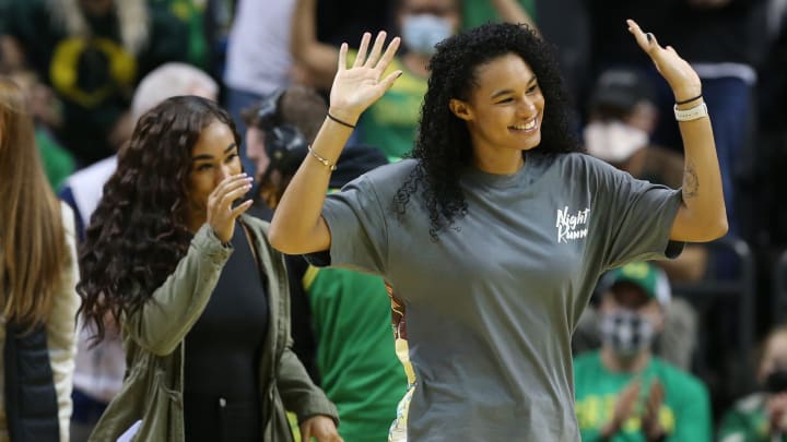 Former Oregon women basketball player Satou Sabally waves to fans between quarters during the game against Saint Martin's.