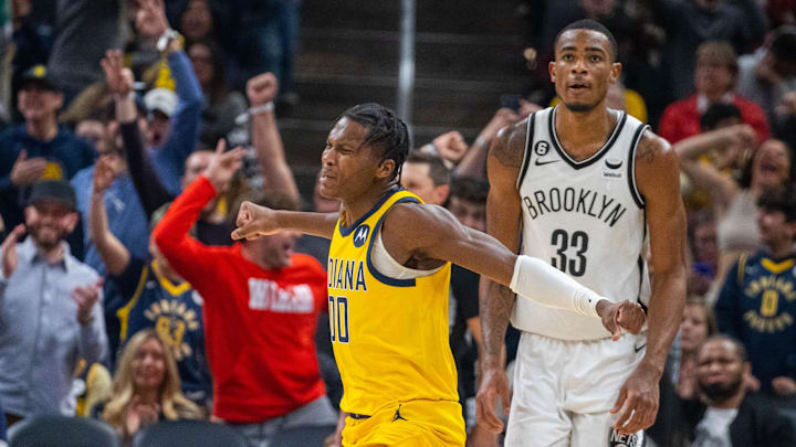 Nov 25, 2022; Indianapolis, Indiana, USA; Indiana Pacers guard Bennedict Mathurin (00) celebrates a basket in the second half against the Brooklyn Nets at Gainbridge Fieldhouse. Mandatory Credit: Trevor Ruszkowski-Imagn Images