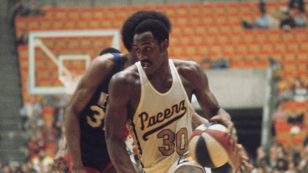 Unknown date and unknown location; USA; FILE PHOTO; Indiana Pacers forward George McGinnis (30) against the New York Nets during an ABA game. Mandatory Credit: Malcolm Emmons-USA TODAY Network.