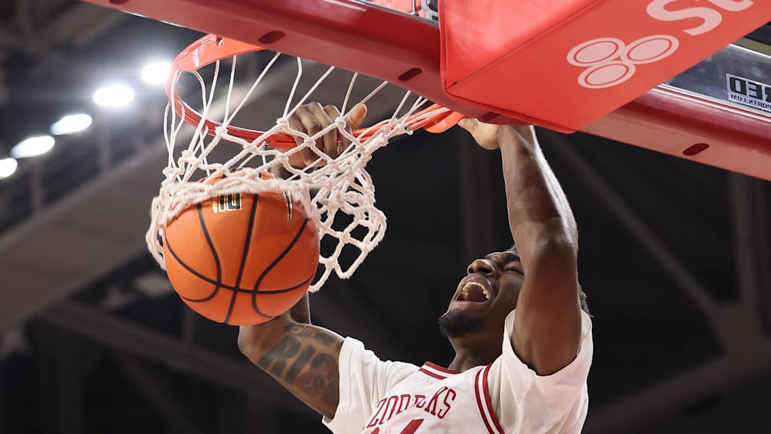 Arkansas wing Billy Richmond III (24) dunks the ball during the first half against Texas at Bud Walton Arena. 