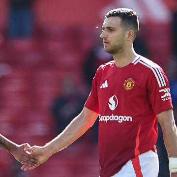 Leny Yoro (left) and Diogo Dalot (right) were spotted in training ahead of the Europa League final.