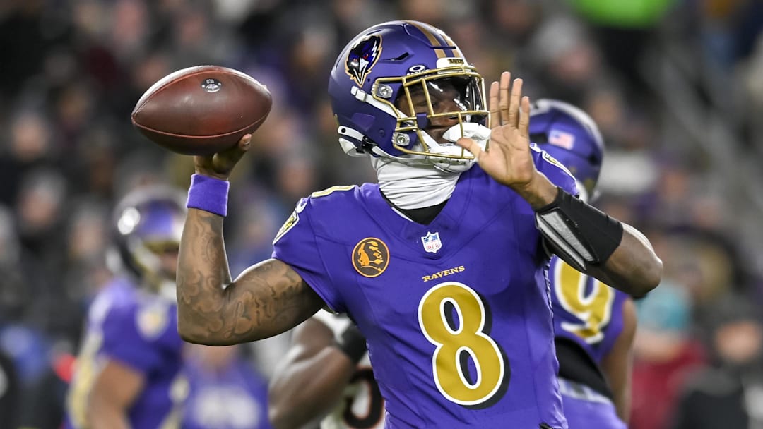 Nov 27, 2025; Baltimore, Maryland, USA;  Baltimore Ravens quarterback Lamar Jackson (8) looks to pass during the game against the Cincinnati Bengals at M&T Bank Stadium. Mandatory Credit: Tommy Gilligan-Imagn Images