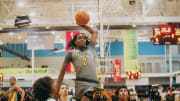 Team Thad’s Jasper Johnson (2) jumps in the air to dunk the ball during a game against Team Oak Soldiers during the Nike Elite Youth Basketball League session one on Saturday, April 27, 2024 at the Memphis Sports & Event Center in Memphis, Tenn.