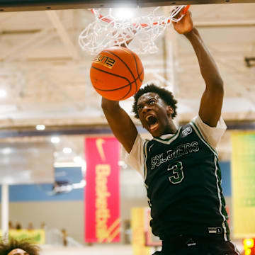 Team Oak Soldier’s AJ Dybantsa (3) dunks the ball against Team Thad during the Nike Elite Youth Basketball League session one on Saturday, April 27, 2024 at the Memphis Sports & Event Center in Memphis, Tenn.