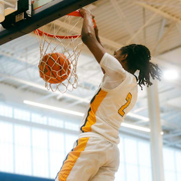 Team Thad’s Jasper Johnson (2) dunks the ball on a fast break during a game against Team Bradley Beal Elite during the Nike Elite Youth Basketball League session one on Friday, April 26, 2024 at the Memphis Sports & Event Center in Memphis, Tenn.