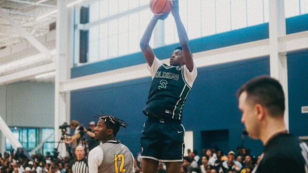 Team Oak Soldiers’ AJ Dybantsa (3) shoots the ball against Team Thad’s DeAndre Lewis (12) during the Nike Elite Youth Basketb