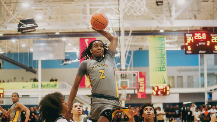 Team Thad’s Jasper Johnson (2) jumps in the air to dunk the ball during a game against Team Oak Soldiers during the Nike Elite Youth Basketball League session one on Saturday, April 27, 2024 at the Memphis Sports & Event Center in Memphis, Tenn.