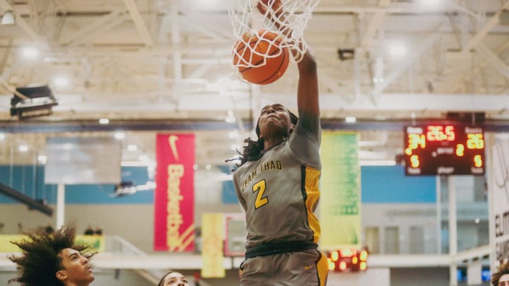 Team Thad’s Jasper Johnson (2) dunks the ball during a game against Team Oak Soldiers during the Nike Elite Youth Basketball League session one on Saturday, April 27, 2024 at the Memphis Sports & Event Center in Memphis, Tenn.