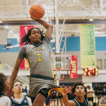 Team Thad’s Jasper Johnson (2) jumps in the air to dunk the ball during a game against Team Oak Soldiers during the Nike Elite Youth Basketball League session one on Saturday, April 27, 2024 at the Memphis Sports & Event Center in Memphis, Tenn.