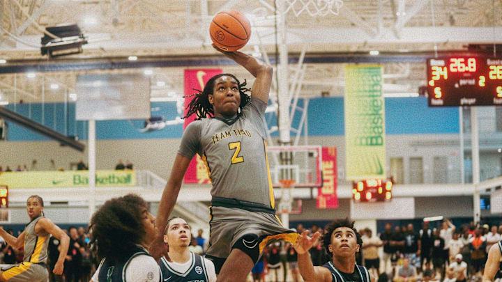 Team Thad’s Jasper Johnson (2) jumps in the air to dunk the ball during a game against Team Oak Soldiers during the Nike Elite Youth Basketball League session one on Saturday, April 27, 2024 at the Memphis Sports & Event Center in Memphis, Tenn.