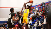 Montverde   s Caleb Gaskins (12) looks to pass the ball against Whitehaven   s Bob Hickerson (20) during a basketball game in the Winter Classic at the McDonald Insurance Arena on Friday, Feb. 09, 2024 in Bartlett, Tenn.