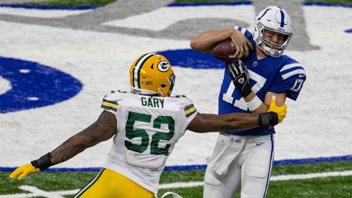 The Packers' Rashan Gary pressures Philip Rivers during the 2020 game in Indianapolis. The teams will meet Sunday at Lambeau.