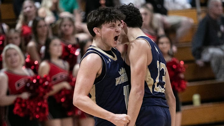 Asa Rogosich and Jake Trottier of SFCA celebrate a basket against ECS in the Class 2A-District 11 semifinals on Feb. 8, 2024.
