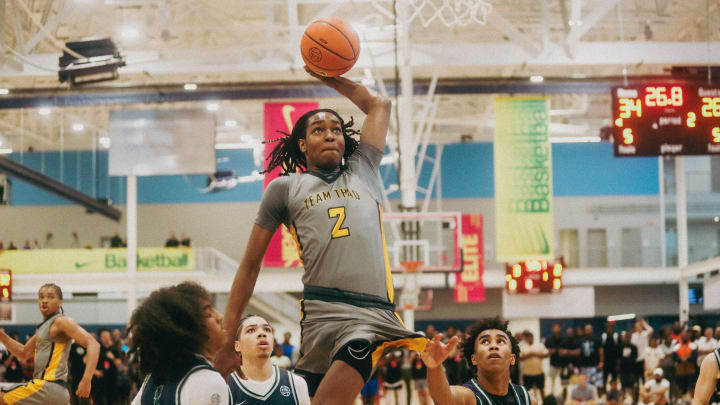 Team Thad’s Jasper Johnson (2) jumps in the air to dunk the ball during a game against Team Oak Soldiers during the Nike Elite Youth Basketball League session one on Saturday, April 27, 2024 at the Memphis Sports & Event Center in Memphis, Tenn.