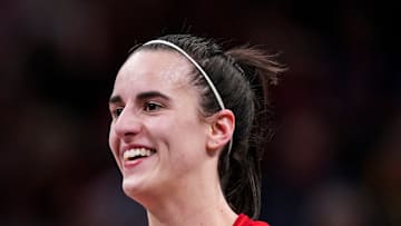 Indiana Fever guard Caitlin Clark (22) smiles during a game between the Indiana Fever and the Las Vegas Aces.