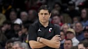 Feb 2, 2025; Cincinnati, Ohio, USA;  Cincinnati Bearcats head coach Wes Miller works the sideline against the West Virginia Mountaineers in the first half at Fifth Third Arena. Mandatory Credit: Aaron Doster-Imagn Images