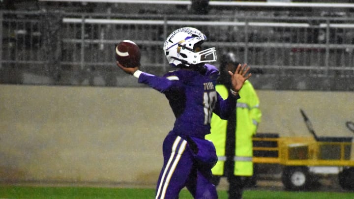 Alvarado quarterback Cardea Collier passes during a bi-district game against Kennedale at Crowley ISD Multipurpose Stadium in a Texas high school playoff game in 2023. 