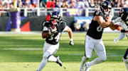 Oct 26, 2025; Baltimore, Maryland, USA; Baltimore Ravens running back Keaton Mitchell (34) rushes during the fourth quarter against the Chicago Bears at M&T Bank Stadium. Mandatory Credit: Geoff Burke-Imagn Images
