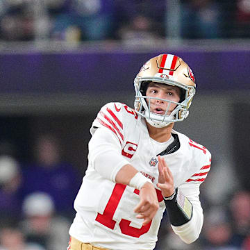 Oct 23, 2023; Minneapolis, Minnesota, USA; San Francisco 49ers quarterback Brock Purdy (13) passes against the Minnesota Vikings in the first quarter at U.S. Bank Stadium. Mandatory Credit: Brad Rempel-Imagn Images