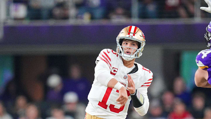 Oct 23, 2023; Minneapolis, Minnesota, USA; San Francisco 49ers quarterback Brock Purdy (13) passes against the Minnesota Vikings in the first quarter at U.S. Bank Stadium. Mandatory Credit: Brad Rempel-Imagn Images