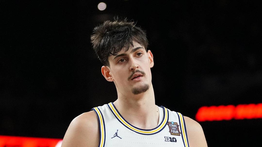 Michigan Wolverines center Aday Mara (15) reacts after a play against the UConn Huskies during the first half in the national championship of the Final Four at Lucas Oil Stadium on April 6, 2026.