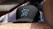 Apr 11, 2019; Cincinnati, OH, USA; A view of a New Era Miami Marlins hat in the dugout during the game against the Cincinnati Reds at Great American Ball Park.