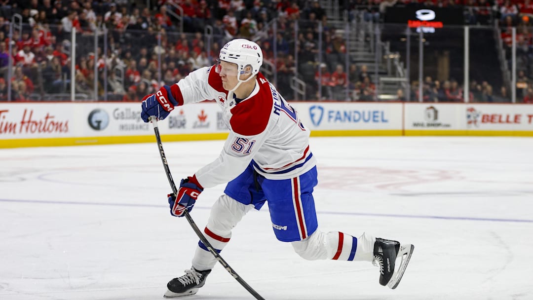 Dec 20, 2024; Detroit, Michigan, USA; Montreal Canadiens left wing Emil Heineman (51) shoots the puck for a goal in the first period against the Detroit Red Wings at Little Caesars Arena. Mandatory Credit: Brian Bradshaw Sevald-Imagn Images