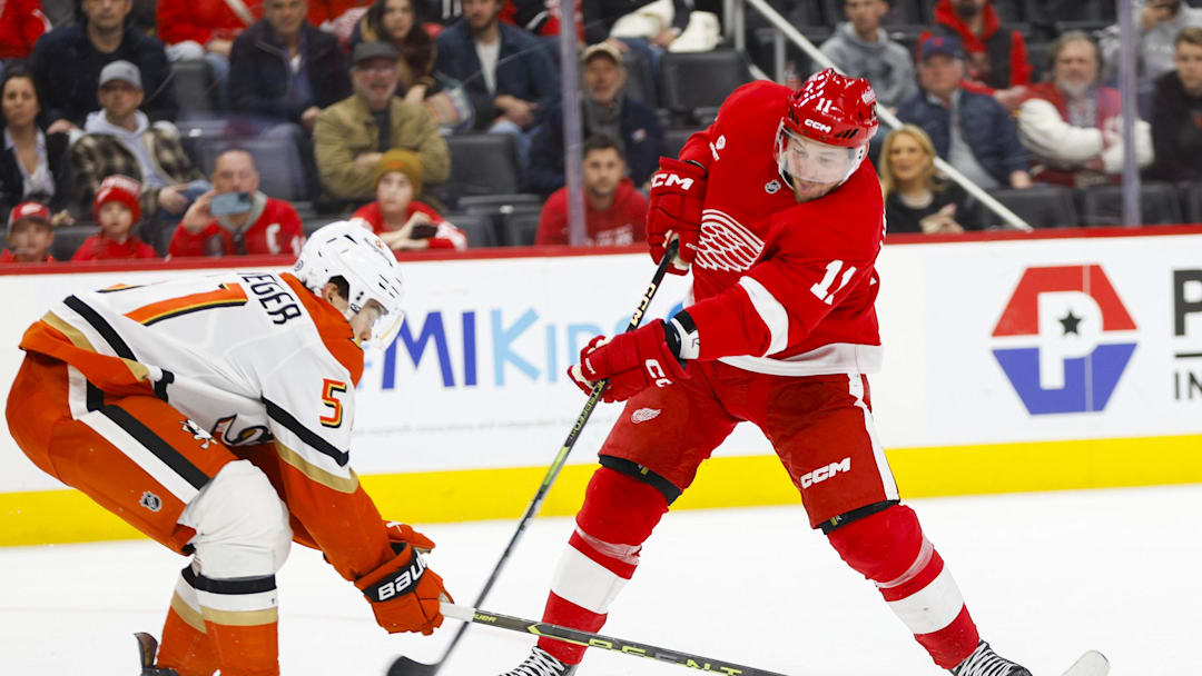 Feb 23, 2025; Detroit, Michigan, USA; Detroit Red Wings right wing Vladimir Tarasenko (11) shoots the puck during an overtime period of the game between the Detroit Red Wings and the Anaheim Ducks at Little Caesars Arena. Mandatory Credit: Brian Bradshaw Sevald-Imagn Images