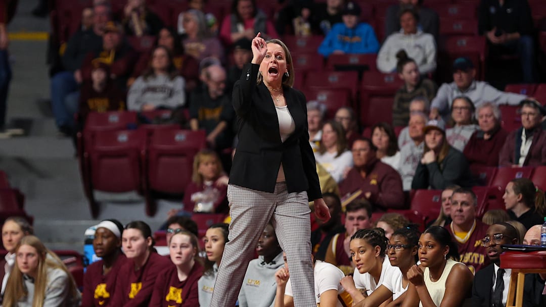 Jan 31, 2024; Minneapolis, Minnesota, USA; Minnesota Golden Gophers head coach Dawn Plitzuweit reacts during the first half against the Penn State Nittany Lions at Williams Arena. Mandatory Credit: Matt Krohn-Imagn Images