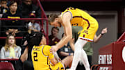 Nov 9, 2024; Minneapolis, Minnesota, USA; Minnesota Golden Gophers guard Mike Mitchell Jr. (2) grabs his leg after an injury during the second half against the Omaha Mavericks at Williams Arena. Mandatory Credit: Matt Krohn-Imagn Images