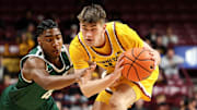 Nov 19, 2024; Minneapolis, Minnesota, USA; Minnesota Golden Gophers guard Brennan Rigsby (24) controls the ball as Cleveland State Vikings guard Je'Shawn Stevenson (4) defends during the first half at Williams Arena. Mandatory Credit: Matt Krohn-Imagn Images