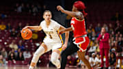 Jan 3, 2024; Minneapolis, Minnesota, USA; Minnesota Golden Gophers guard Amaya Battle (3) works around Maryland Terrapins guard Bri McDaniel (24) during the first half at Williams Arena. Mandatory Credit: Matt Krohn-Imagn Images