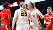 Jan 3, 2024; Minneapolis, Minnesota, USA; Minnesota Golden Gophers forward Mallory Heyer (24) celebrates with guard Grace Grocholski (25) during the first half against the Maryland Terrapins at Williams Arena. Mandatory Credit: Matt Krohn-Imagn Images
