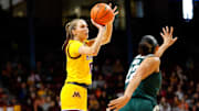 Jan 20, 2024; Minneapolis, Minnesota, USA; Minnesota Golden Gophers guard Mara Braun (10) shoots as Michigan State Spartans guard Moira Joiner (22) defends during the first half at Williams Arena. Mandatory Credit: Matt Krohn-Imagn Images