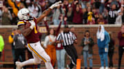 Oct 26, 2024; Minneapolis, Minnesota, USA; Minnesota Golden Gophers running back Darius Taylor (1) runs the ball  for a touchdown against the Maryland Terrapins during the second half at Huntington Bank Stadium.