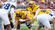 Sep 14, 2024; Minneapolis, Minnesota, USA; Minnesota Golden Gophers quarterback Drake Lindsey (3) calls a play against the Nevada Wolf Pack during the second half at Huntington Bank Stadium. Mandatory Credit: Matt Krohn-Imagn Images