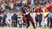 Nov 4, 2023; Minneapolis, Minnesota, USA; Minnesota Golden Gophers defensive back Darius Green (12) celebrates a fumble recovery against the Illinois Fighting Illini during the second half at Huntington Bank Stadium. Mandatory Credit: Matt Krohn-Imagn Images