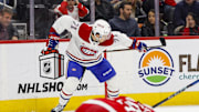 Dec 20, 2024; Detroit, Michigan, USA; Montreal Canadiens center Jake Evans (71) celebrates after scoring a goal in the first period against the Detroit Red Wings at Little Caesars Arena. Mandatory Credit: Brian Bradshaw Sevald-Imagn Images