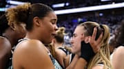 Oct 16, 2024; Minneapolis, Minnesota, USA; New York Liberty guard Sabrina Ionescu (20) celebrates with forward Nyara Sabally (8) after game three of the 2024 NBA Finals against the Minnesota Lynx at Target Center. Mandatory Credit: Matt Krohn-Imagn Images