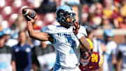 Rhode Island Rams quarterback Devin Farrell (7)