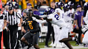Nov 2, 2024; Waco, Texas, USA; Baylor Bears wide receiver Ashtyn Hawkins (6) makes a catch against TCU Horned Frogs safety Bud Clark (21) during the second half at McLane Stadium. Mandatory Credit: Chris Jones-Imagn Images