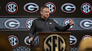 Oct 15, 2024; Birmingham, AL, USA; Georgia Bulldogs head coach Mike White talks with the media during SEC Media Days at Grand Bohemian Hotel. Mandatory Credit: Vasha Hunt-Imagn Images